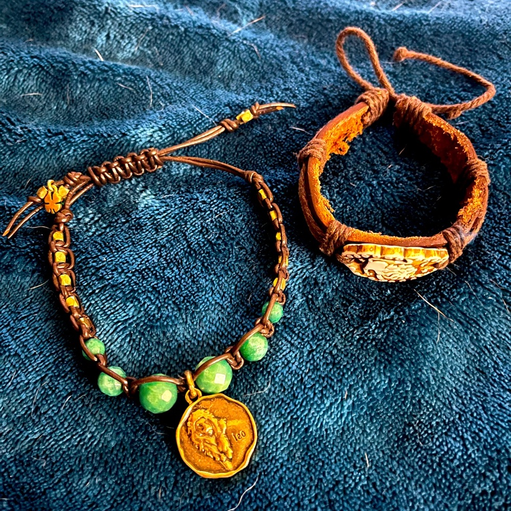 Two leather bracelets representing the horoscope sign Leo. Lucky brand